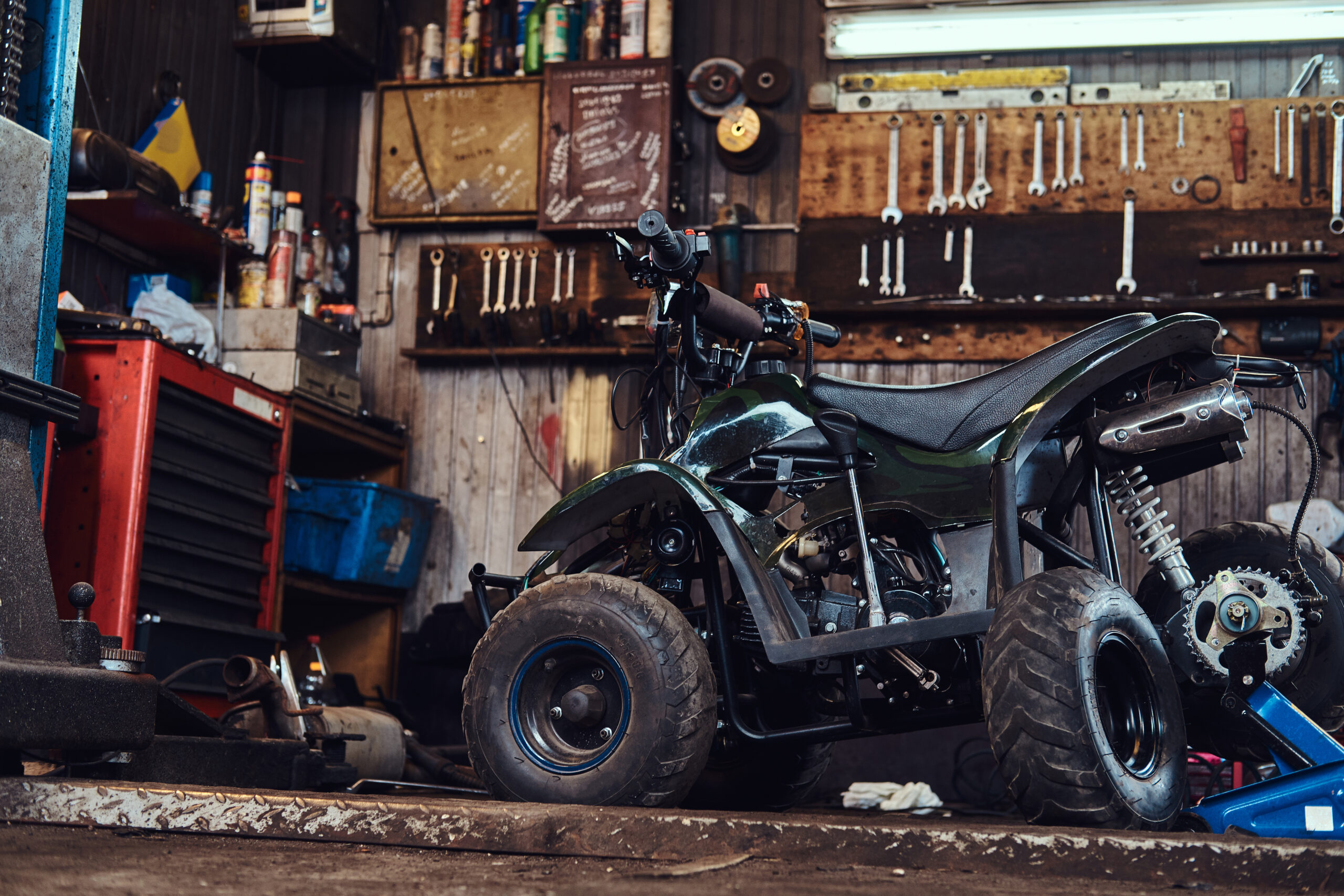 Kids quad bike in shed